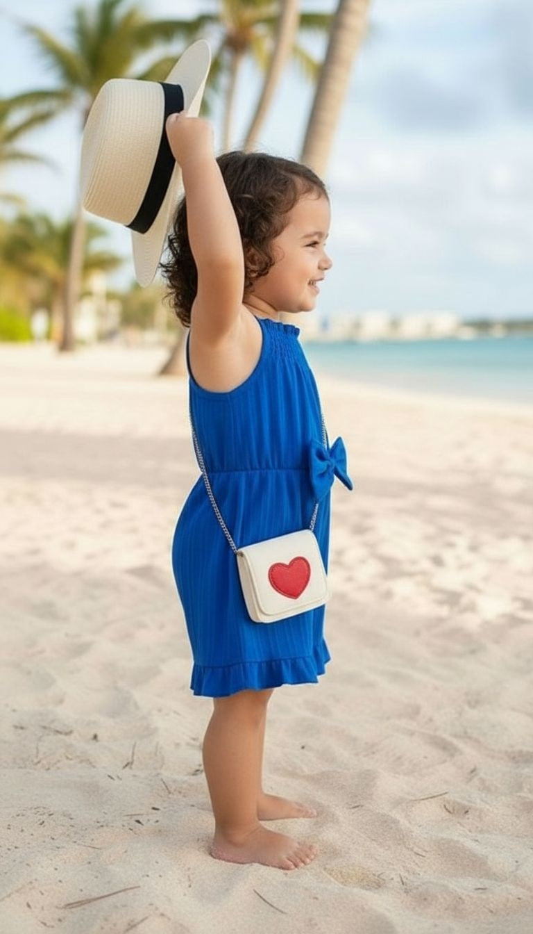Girls’ Ruffle Hem Smocked Romper with Bow Detail – Summer One‑Piece Outfit